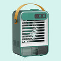 Dark green portable desktop humidifier with USB port on a wooden desk.