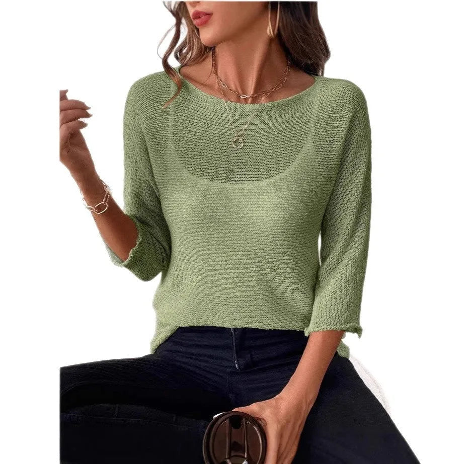 Women's off-shoulder knitted top in light blue with 3D pattern and 3/4 sleeves.