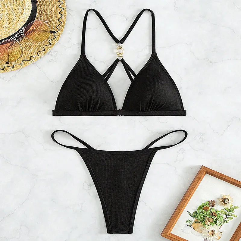 Women's black hollow backless split bikini triangle swimwear with sleeveless nylon construction