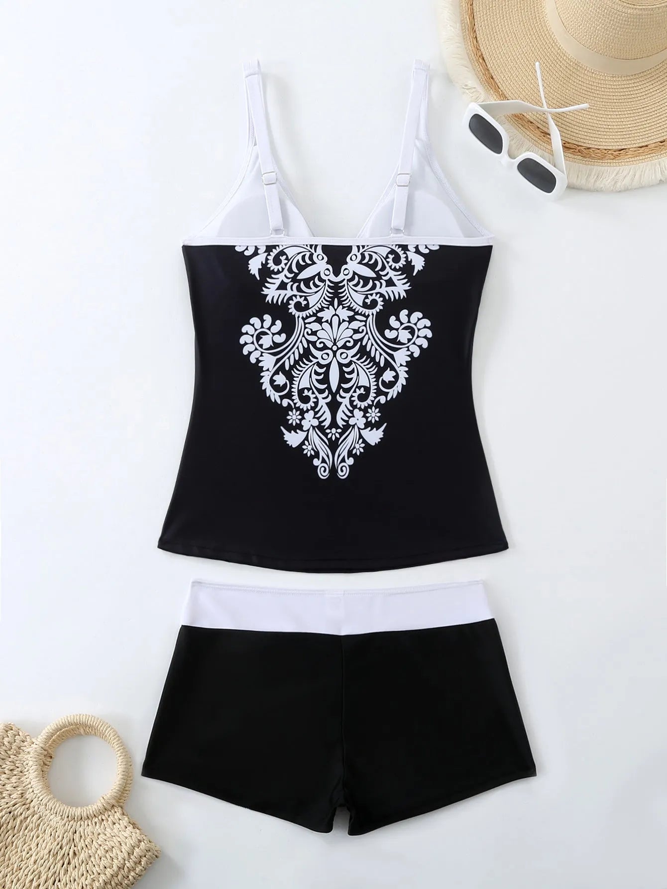 Women's plus size printed swimsuit and matching trunks set in black or rose red colour