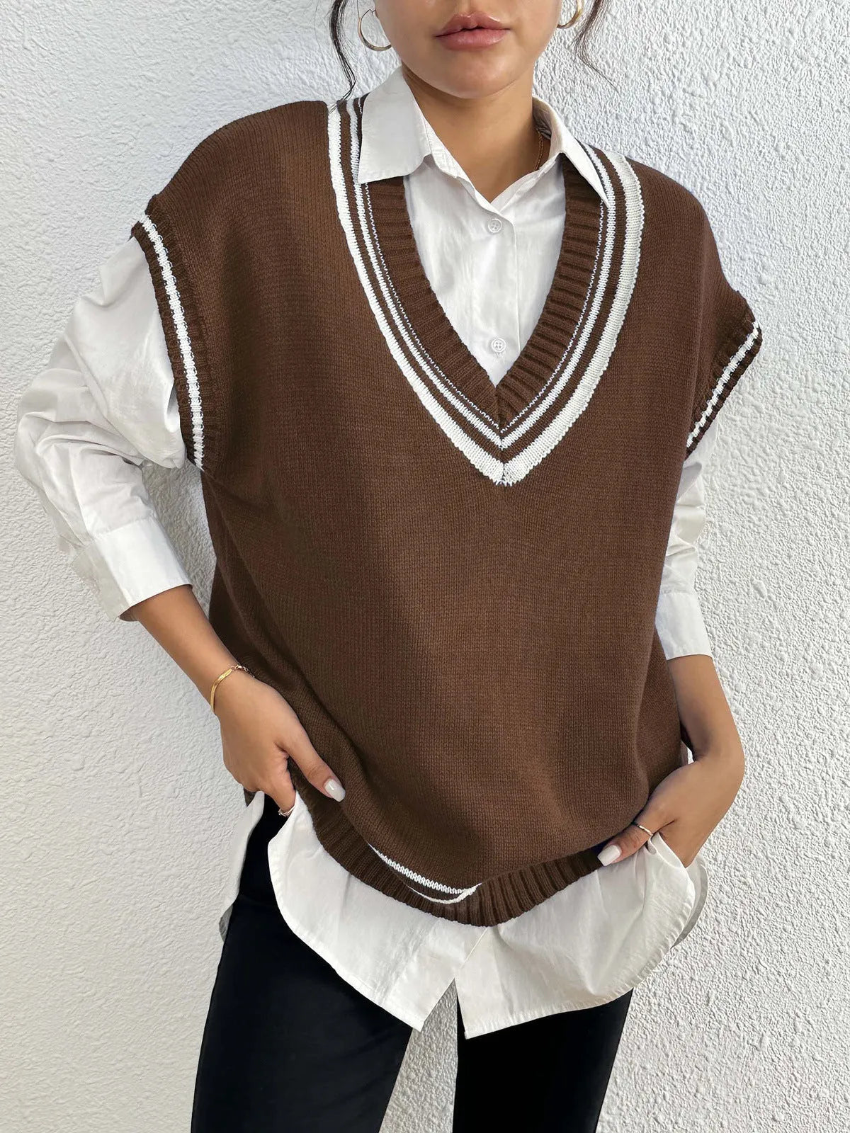 Women's college style loose fit vest sweater in black, blue, and coffee colour options