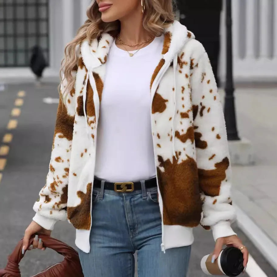 Yellow brown cow animal print hooded cardigan jacket with zip front and regular sleeves.