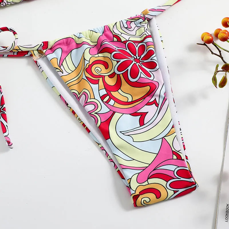 Women's triangle printed bikini set with hanging neck design in multicolour pattern