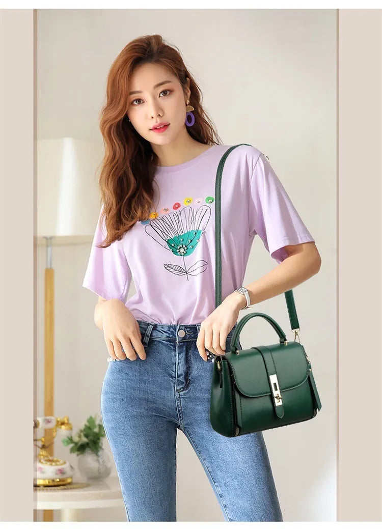 Soft leather women's messenger bag in square vertical design with shoulder strap