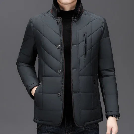Men's solid colour winter short coat with side pockets, shown in dark blue.