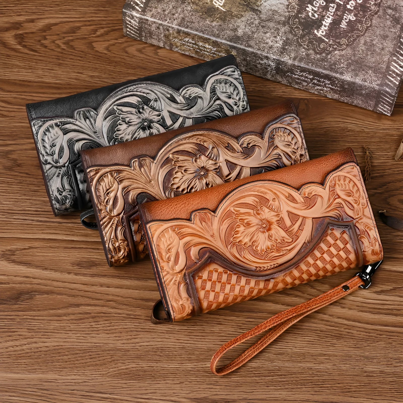Women's brown genuine leather tri-fold wallet with embossed floral pattern showing interior compartments