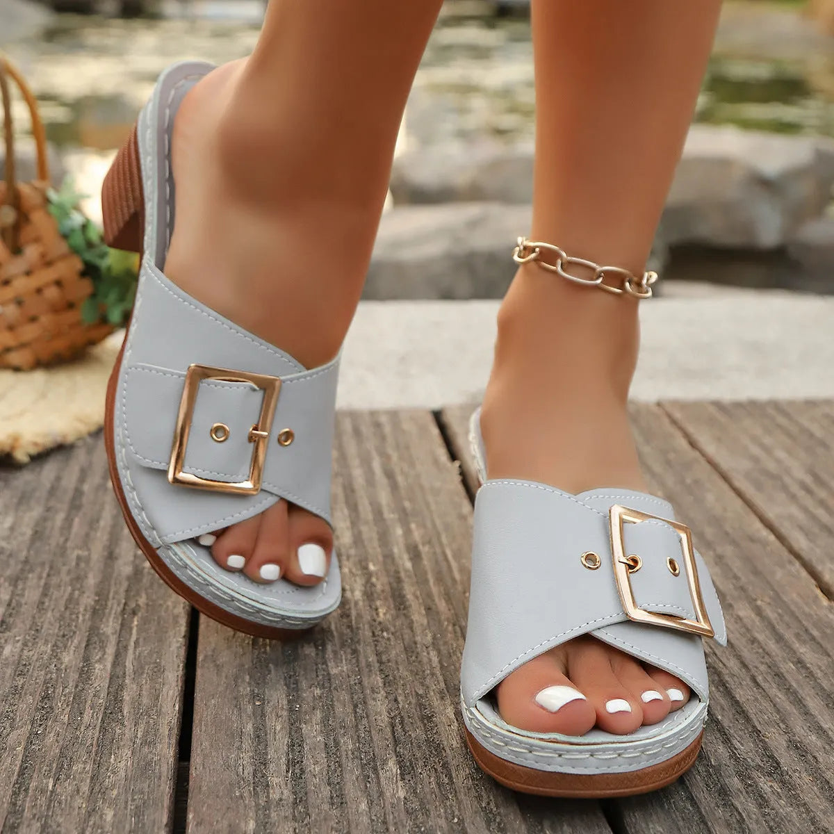 Women's chunky heel slippers with metal buckle in black or light blue on rubber sole