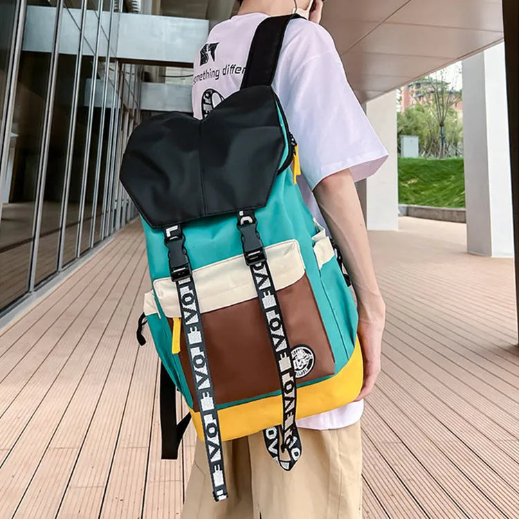 Oxford cloth backpack in black showing handheld strap and shoulder straps