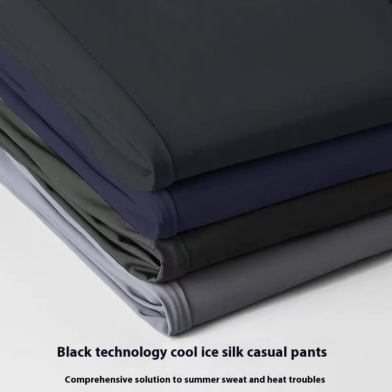 Men's loose fit straight leg Ice Silk trousers in black, dark blue, or light grey with an elasticated waistband.