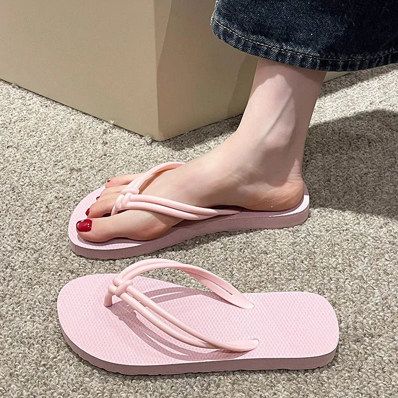 Men's PVC flip flop slippers in beige with a toe-covering design and injection moulded sole.
