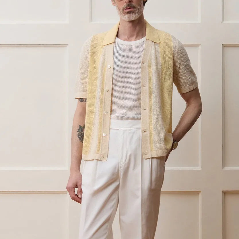 Yellow tencel polo shirt with asymmetric hollow-out design and short sleeves for summer casual wear