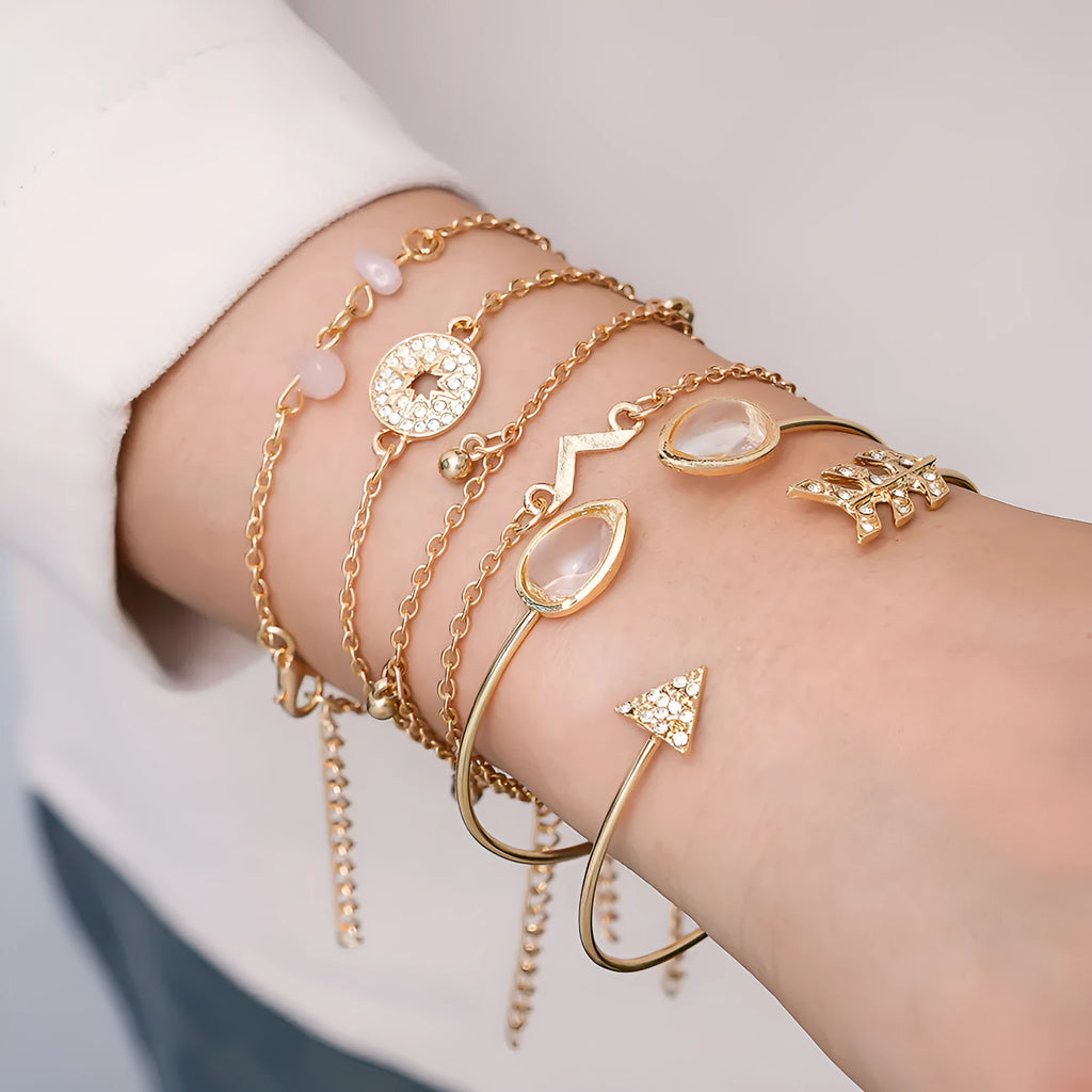 Gold zinc alloy women's bracelet set with arrow, water drop, and V-shaped pendants