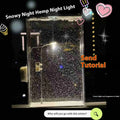 DIY snowy night landscape lights kit showing small street light with flowing snow effect for desktop decoration
