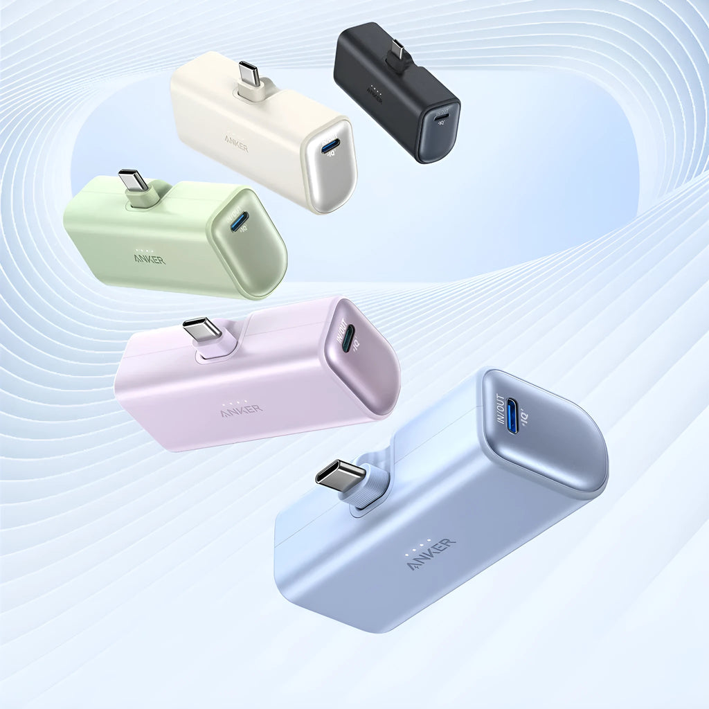 Compact capsule power bank in multiple colours showing USB-C port and foldable connector