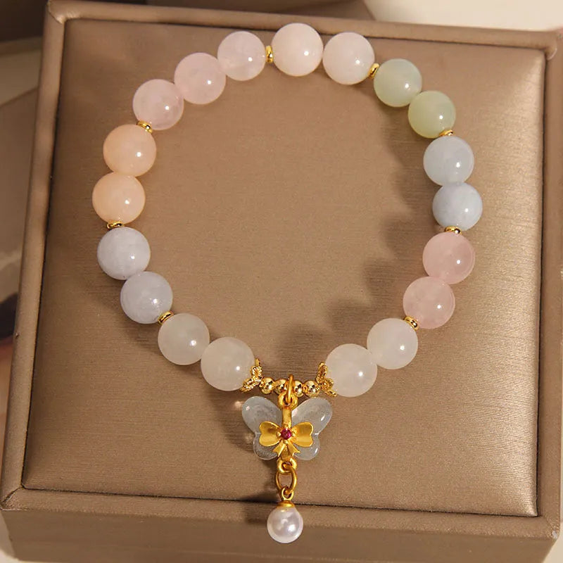 Women's crystal bead bracelet with a colourful natural Morganite stone butterfly pendant.