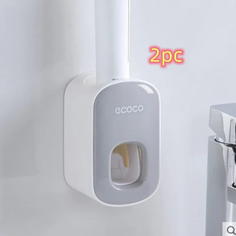 Wall mounted automatic toothpaste holder dispenser set with toothbrush slots and upside-down mouthwash cup in black plastic