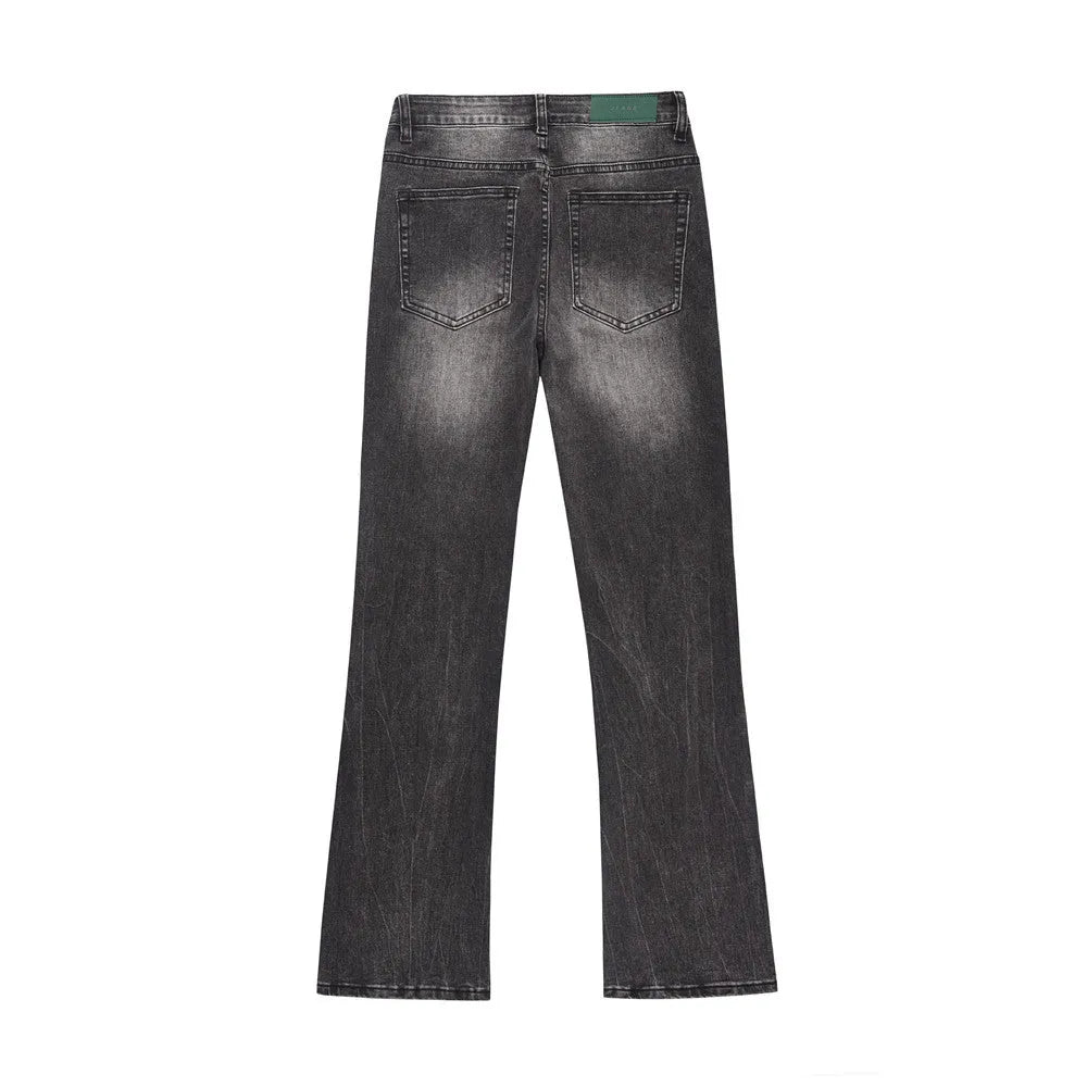 Men's black washed wear-white denim jeans on a plain background showing front view