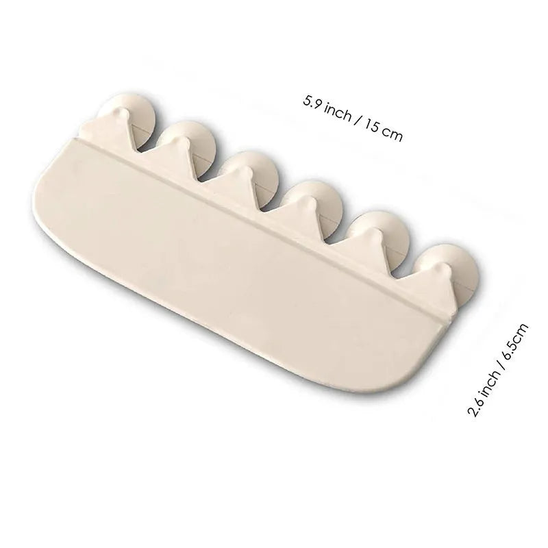 White PVC urine blocking board for children's toilet training placed on toilet