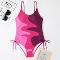 Women's sleeveless one-piece swimsuit in blue, purple, brown, or green colours for swimming sports