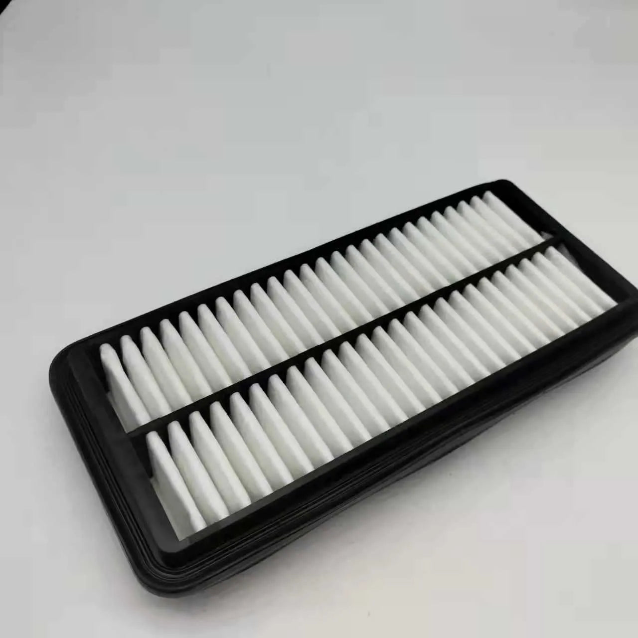 Black car air filter for Modern vehicles with dimensions 256*113*40 mm