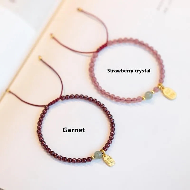 Hand-woven red rope bracelet with strawberry quartz crystals in national tide style