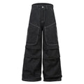 Black pleated work jeans with multiple pockets, featuring a zip fly and mid-waist design.