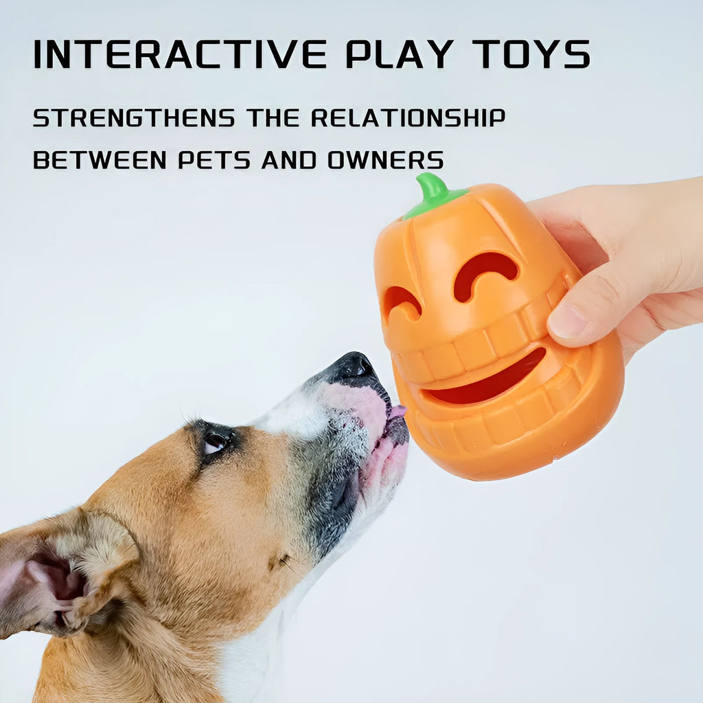 Orange Halloween pumpkin shaped dog chew toy with a treat-dispensing funnel hole.