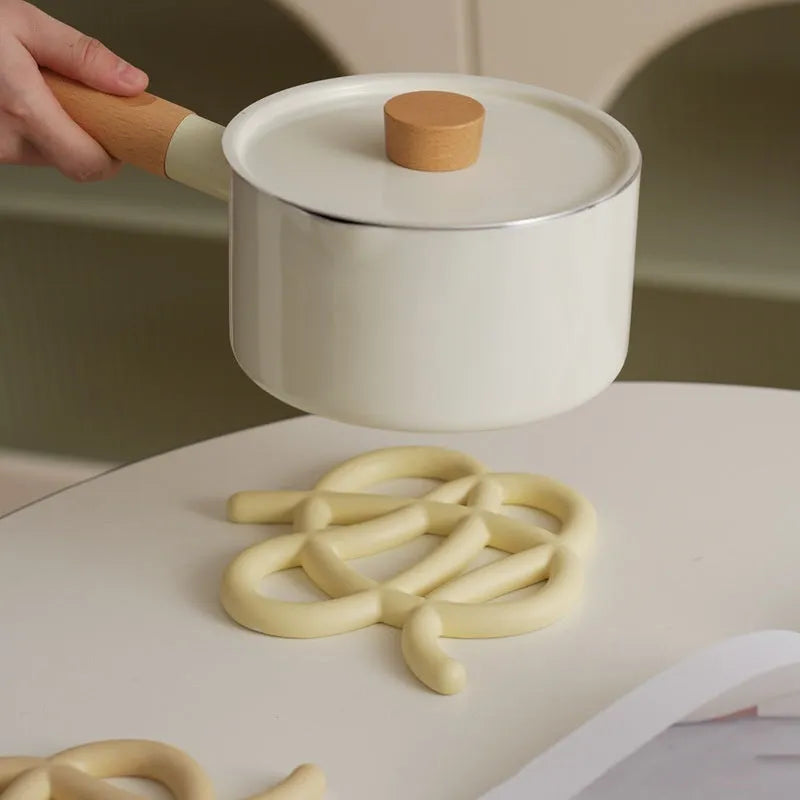 Ceramic heat proof mat in modern simplicity design with irregular shape