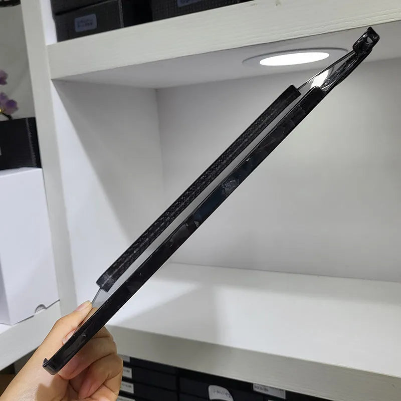 Genuine carbon fibre flat protective cover for Apple iPad Pro 11 with embossed plaid pattern.