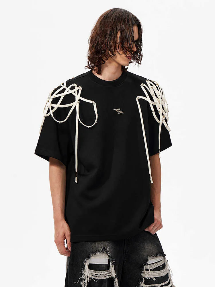 Black women's T-shirt with rivet ribbon padded shoulders and loose fit short sleeve design