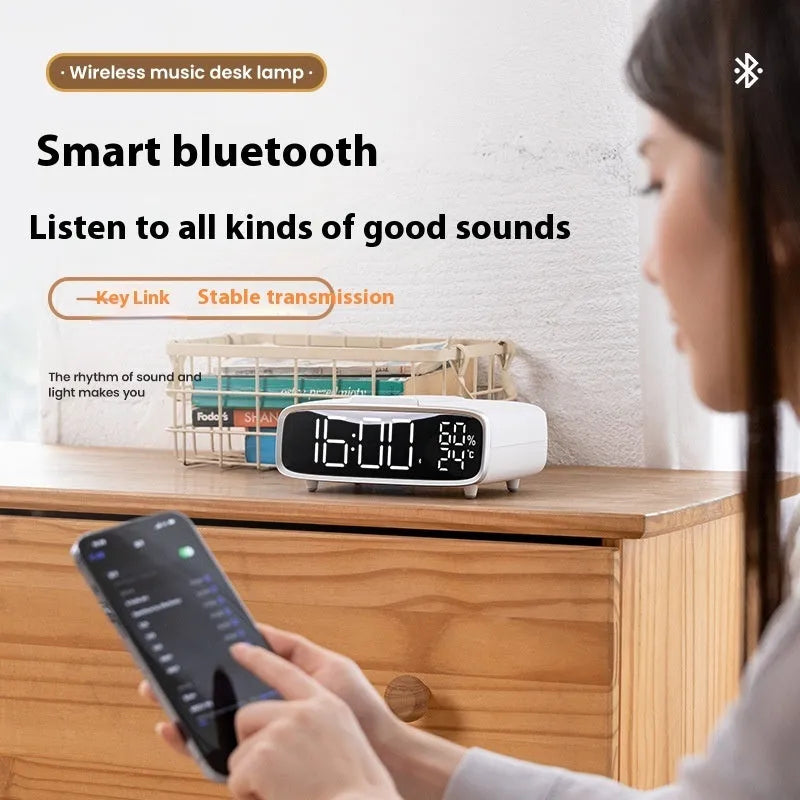 White wireless charging Bluetooth speaker alarm clock with LED display