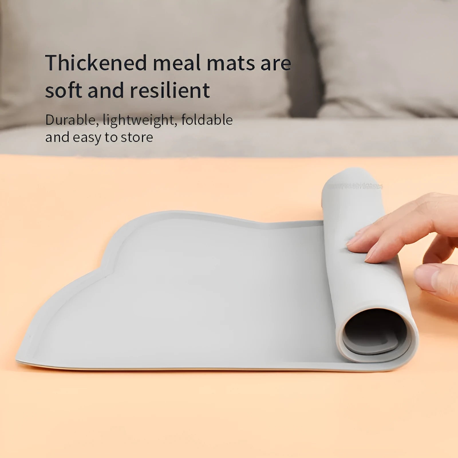 Blue silicone pet feeding mat with raised border for dog and cat food bowls