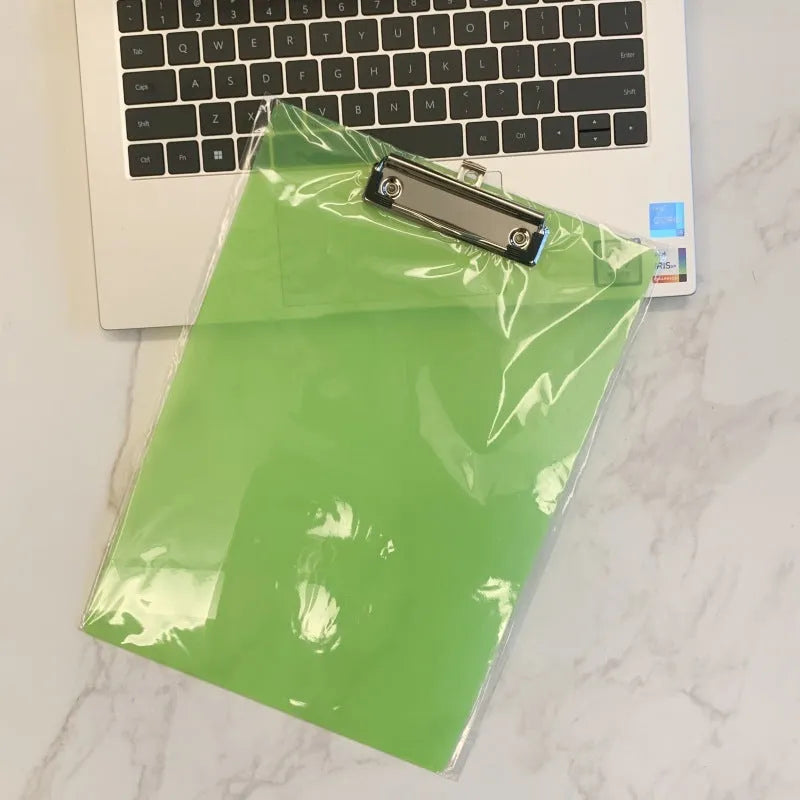 Transparent A4 writing board pad with metal clip holding documents, available in blue, green, red, and white colours