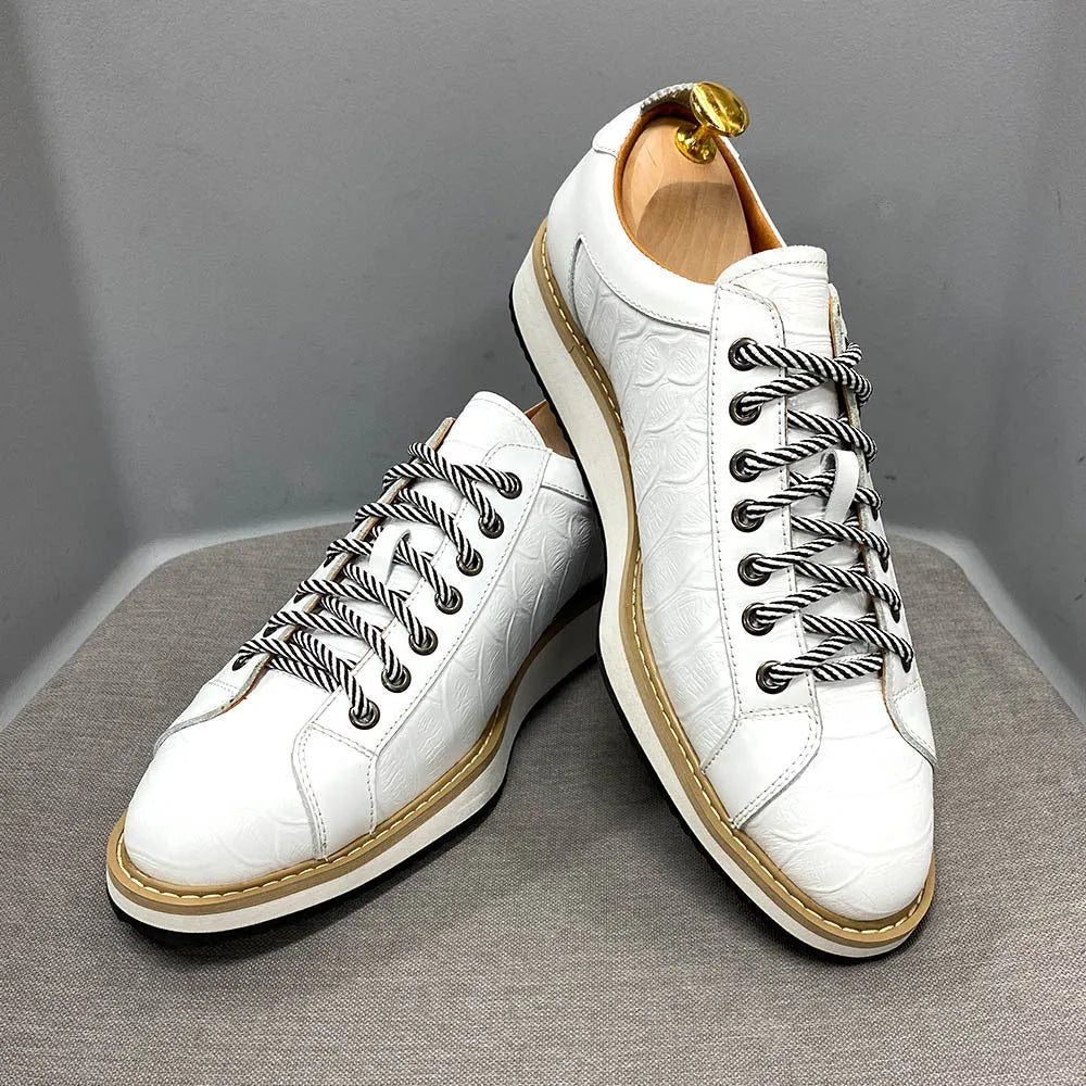 Men's low-cut casual shoes with an embossed pattern and front tie laces, shown in multiple colours.