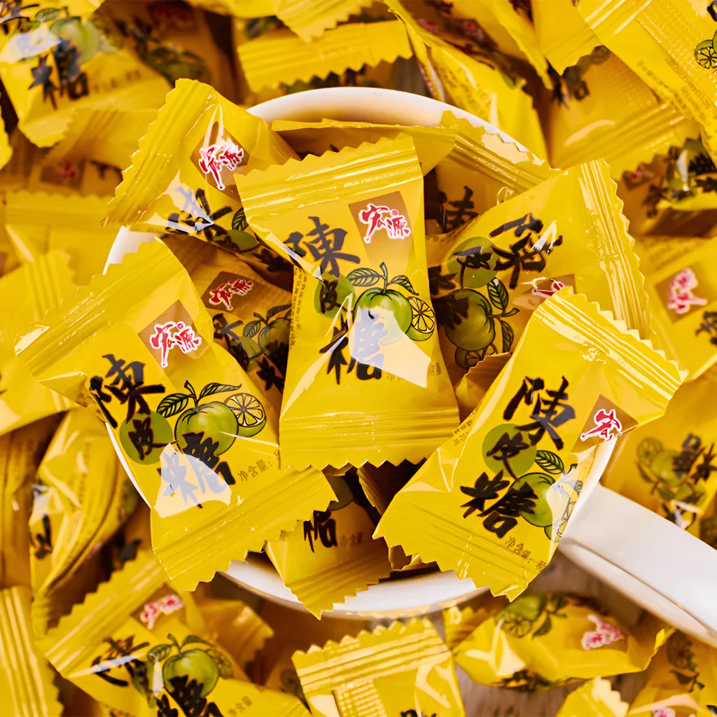 Bag containing three packs of hard candy: tangerine peel, plum sugar, and guava flavours.