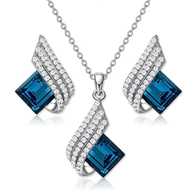 Women's electroplated necklace and earring set with cross chain design and glass pendant