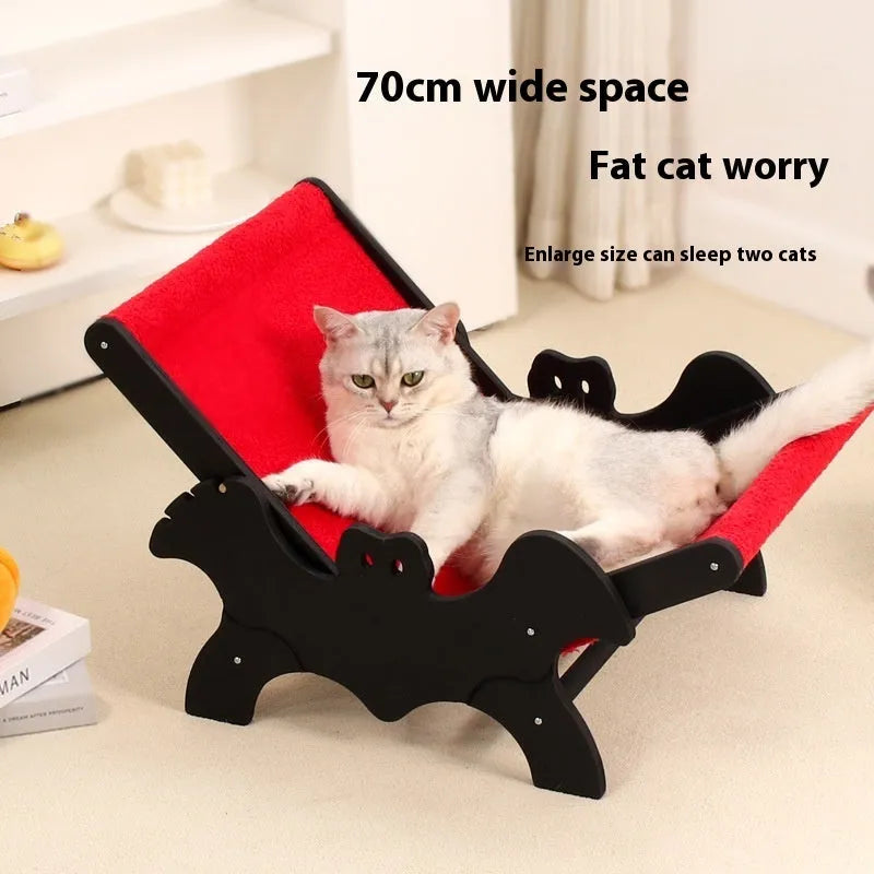 Black and red Halloween-themed wooden cat lounger bed for use as a cage accessory.