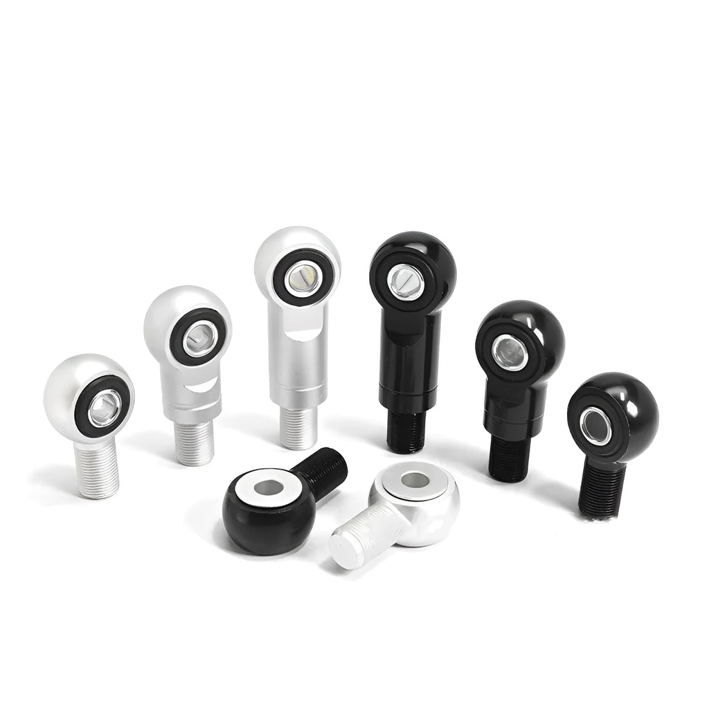 CNC aluminium motorcycle shock fork head riser in black and silver, showing 2CM and 4CM lift options.