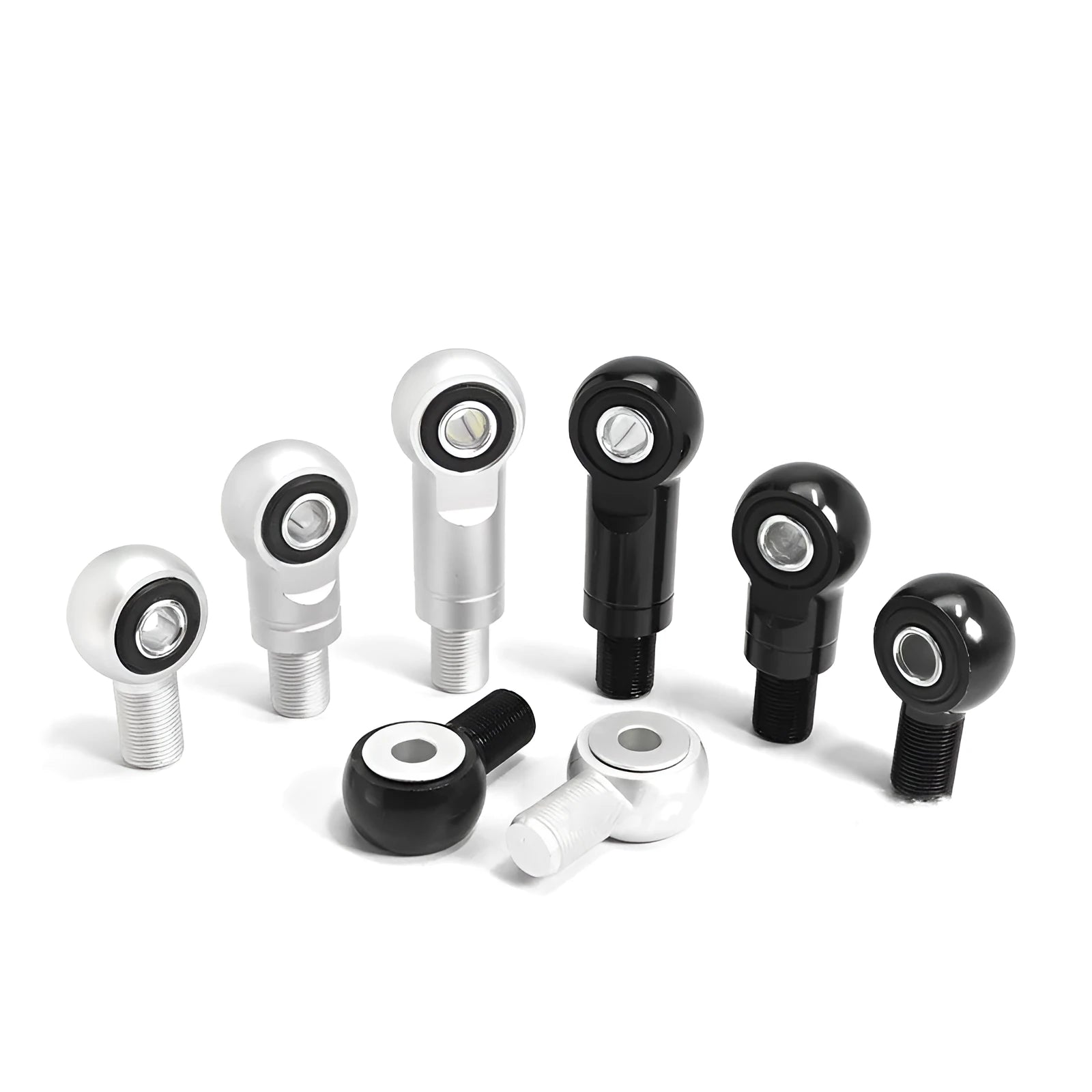CNC aluminium motorcycle shock fork head riser in black and silver, showing 2CM and 4CM lift options.