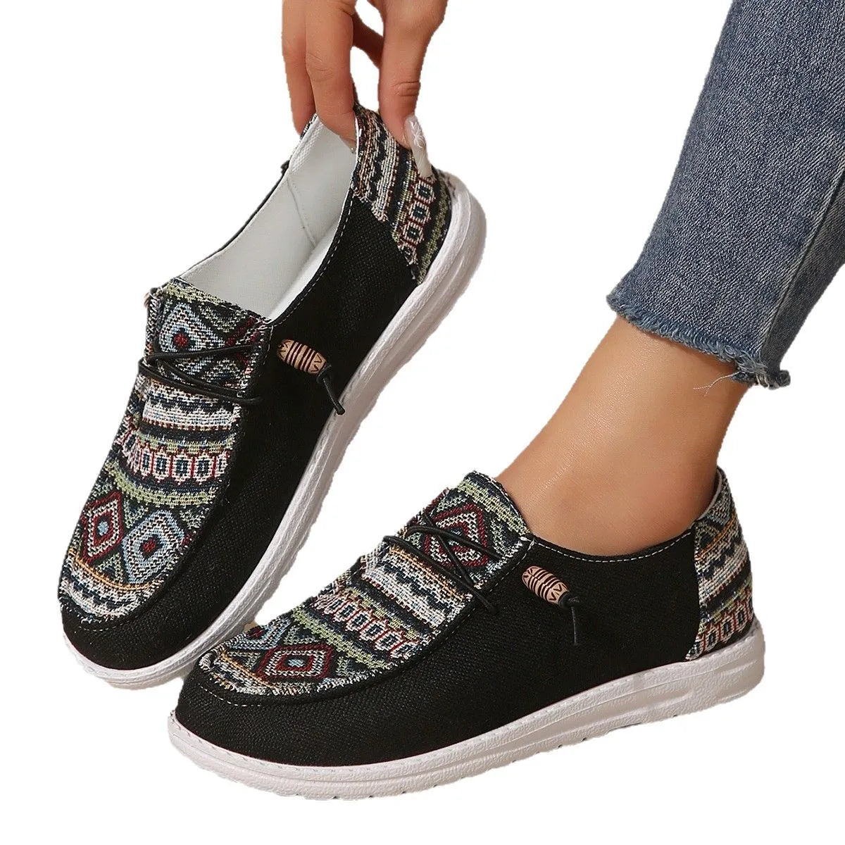 Women's low-top slip-on flat shoes with a round toe in artificial PU, shown in khaki colour on a white background.