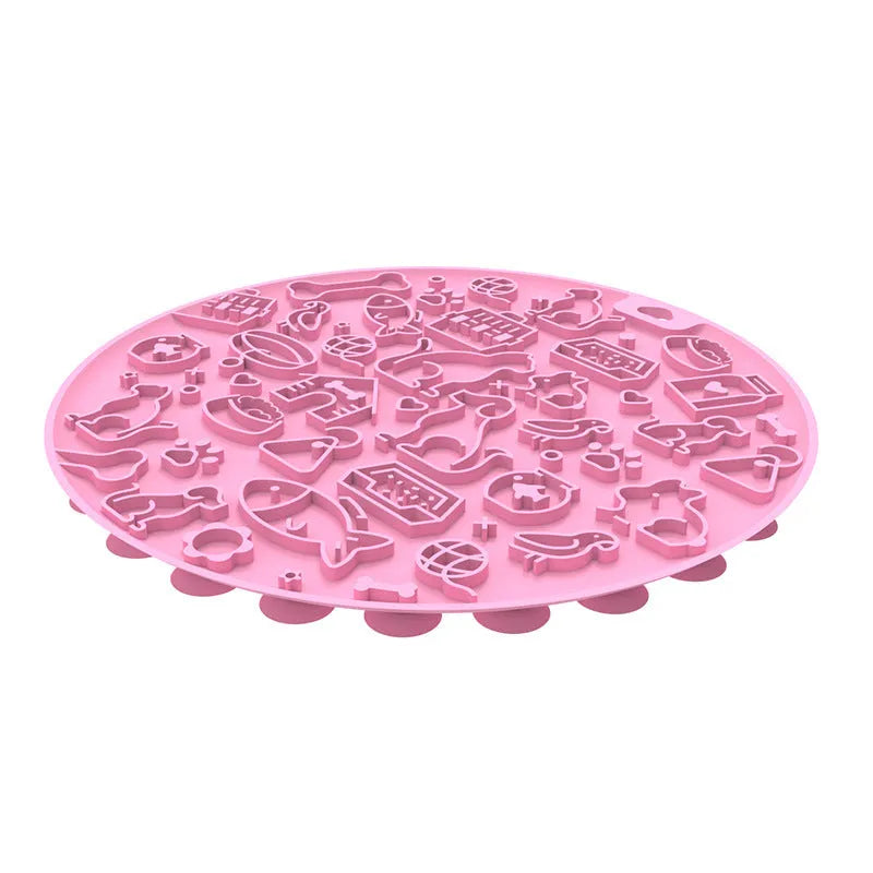 Round silicone pet lick mat in mint colour with suction cup on the underside
