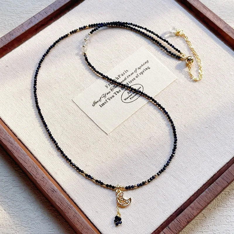 Close-up of a blue sandstone and gold multi-layer three-ring bracelet for women.