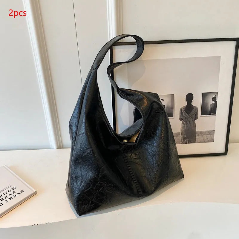 Soft leather casual shoulder bag with large capacity in street trend styling