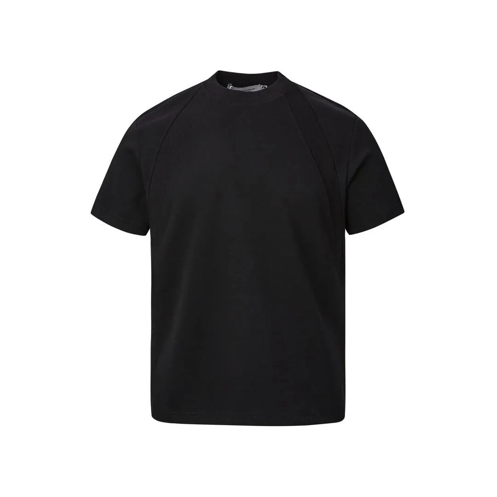 Loose-fit short sleeve top with textured air layer stitching in black.