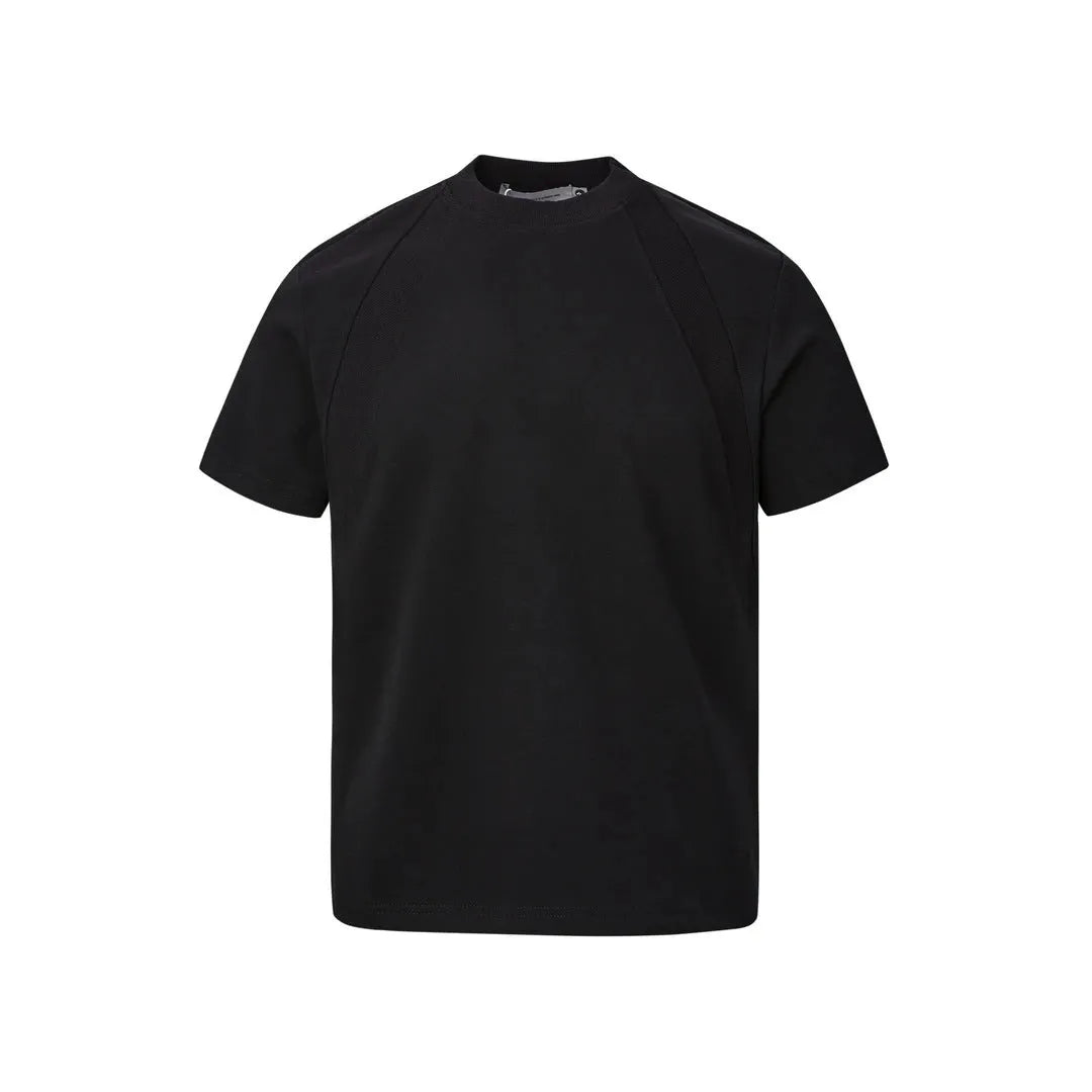 Loose-fit short sleeve top with textured air layer stitching in black.