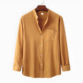 Men's brown long sleeve cotton blend shirt and casual trousers set on a hanger