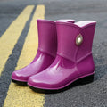 Women's PVC rain boots in beige colour with low tube design and non-slip soles