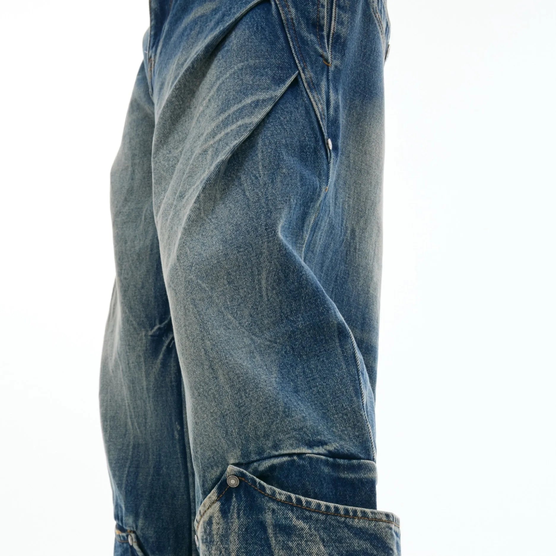 Men's Verdant Blue jeans with a retro washed burst pattern and loose curved knife fit