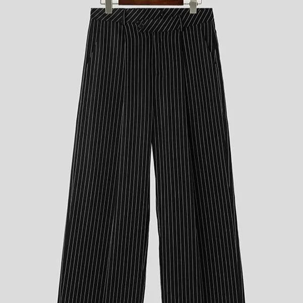 Man wearing black vertical stripe pleated casual trousers.