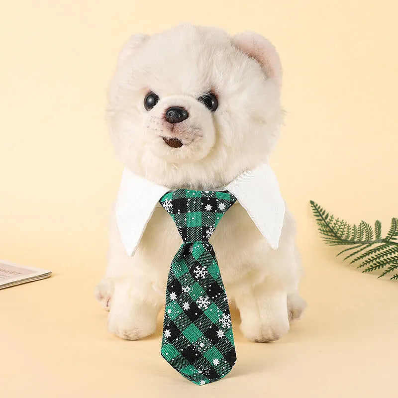 Adjustable Christmas dog necktie with red plaid and snowflake pattern on a white background